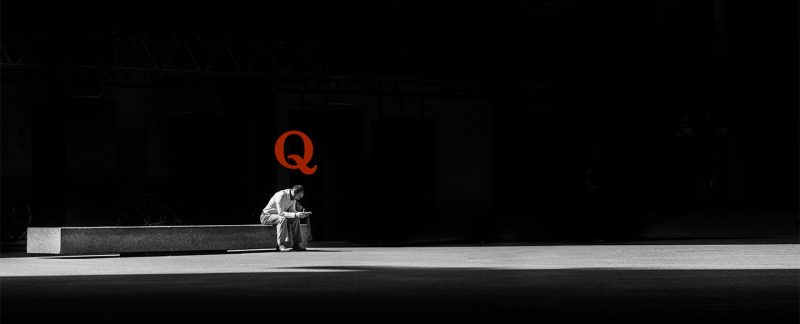Man sitting and Quora logo