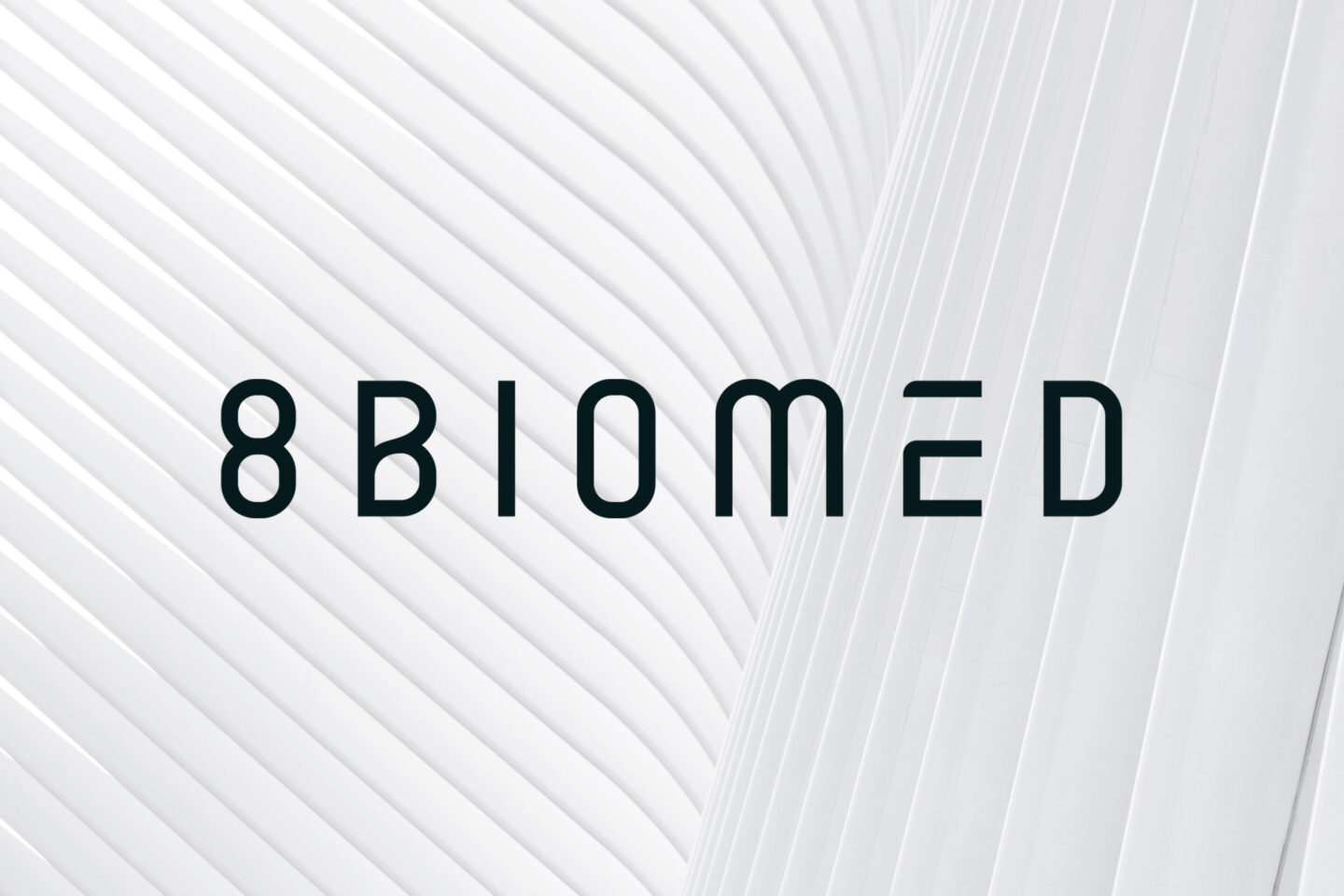 The title 8 Biomed on white background