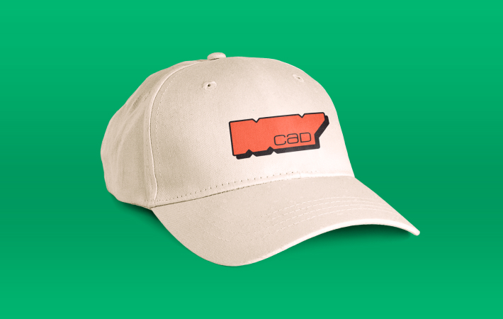 Beige baseball cap branded with very distinguishing red logo of MYCAD on a green background