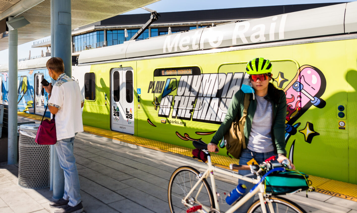PlayLA campaign artwork featured on an LA Metro train, turning public transit into a bold, high-energy brand moment promoting inclusive youth sports
